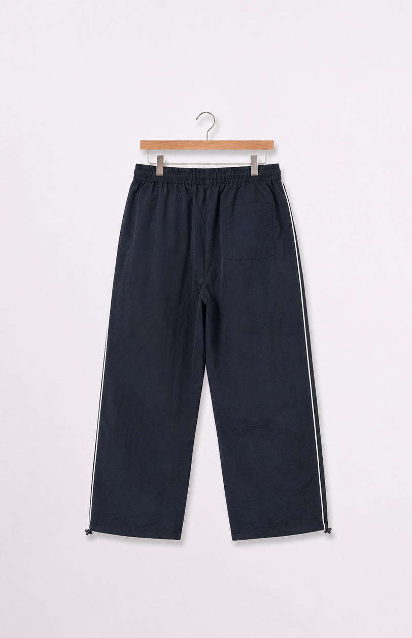 パンツ TTT_MSW logo track pants/BLK Tribal Nylon Track Pant | Black